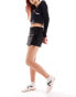 COLLUSION low rise wrap skort with tie detail in black