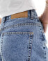 Фото #2 товара ASOS DESIGN Tall denim bermuda short in midwash blue