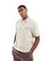 Фото #1 товара ASOS DESIGN relaxed polo shirt in beige towelling with embroidery