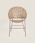 Rattan chair with metal structure