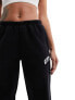 Фото #7 товара The Couture Club varsity relaxed joggers in black