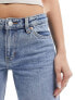 Monki Imoo low waisted wide fit jeans in mid blue wash