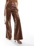 ASOS DESIGN leather look wide leg trousers in animal