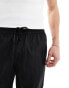 ASOS DESIGN wide awkward length nylon trouser with toggle detail in black