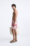 LONG FLORAL PRINT SWIMMING TRUNKS