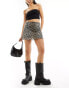 Фото #2 товара Reclaimed Vintage mini skirt with bow detail in animal print co-ord