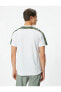 Фото #4 товара Футболка мужская Koton с футболкой с надписью на спортивной облегающей мужской футболке с деталями камуфляжа.