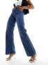 Фото #1 товара Vero Moda wide leg jeans with rose print in dark blue denim