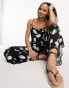 Фото #2 товара ASOS DESIGN strappy culotte jumpsuit in large daisy print