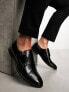 ASOS DESIGN monk shoes in black faux leather with emboss panel