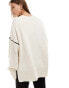 ASOS DESIGN chunky cardigan with contrast seams and pocket in cream