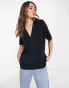 Фото #1 товара ASOS DESIGN relaxed polo shirt with deep v in black