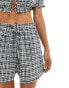 ASOS DESIGN short with ruffle detail in mono gingham co-ord