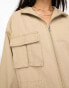 ASOS DESIGN oversized washed parka with cargo pockets in sand