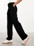 Monki tapered leg trousers with pleat front in black