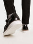 ASOS DESIGN brogue monk shoes in black leather with white wedge sole