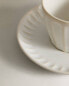 Фото #4 товара Stoneware teacup and saucer with raised design