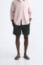 TEXTURED COTTON BERMUDA SHORTS