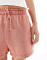 Фото #3 товара ASOS DESIGN unisex shorter length slim shorts in washed pink