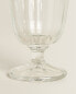 Raised faceted wine glass