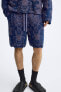 Irregular jacquard knit bermuda shorts