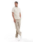 ASOS DEISGN polo in beige stripe texture