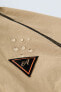 Water-repellent jacket with contrast trims