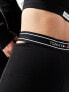 Фото #3 товара Tommy Jeans logo taping legging shorts in black