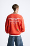 PAINT SPLATTER SLOGAN SWEATSHIRT