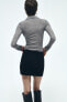 Фото #4 товара Мини-юбка из плотной синтетической ткани ZARA