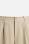 STRAIGHT-LEG PLEATED TROUSERS