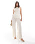 Фото #1 товара In The Style x Perrie Sian plisse wide leg trousers co-ord in cream