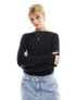 Weekday open back seamless long sleeve top in black M - фото #3