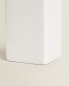 White earthenware toothbrush holder