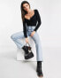 ASOS DESIGN knitted top with sweetheart neck and lace up front detail in black