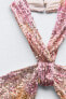 Sequinned halter dress with knot