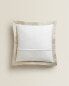 Textured cushion cover with linen border