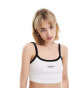 Фото #4 товара Calvin Klein Jeans monologo ringer rib crop tank in white - ASOS Exclusive