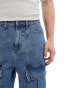 Фото #5 товара ASOS DESIGN standard length denim jorts with panels in mid blue wash