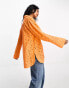 ASOS DESIGN relaxed broderie shirt with dipped hem in orange