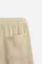 CREASED-EFFECT BERMUDA SHORTS