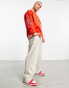 Фото #2 товара ASOS DESIGN oversized jersey jacket in red with varsity badge and tipping