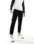 DTT cropped tapered fit cord trousers in black