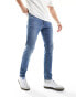 Фото #8 товара Levi's 512 Slim taper fit jeans in mid blue wash