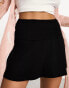 Фото #1 товара Miss Selfridge fold over waistband a line mini flippy skirt in black