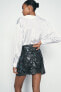 SEQUIN KNIT MINI SKIRT