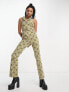 ASOS DESIGN twill belted zip front sleeveless jumpsuit in geo print