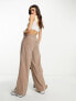 Фото #4 товара ASOS DESIGN drapey wide leg trousers in baby cord brown co-ord