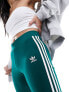 Фото #9 товара adidas Originals three stripe flared leggings in collegiate green