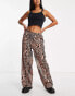 Фото #4 товара ASOS DESIGN Petite satin pull on trousers zebra print